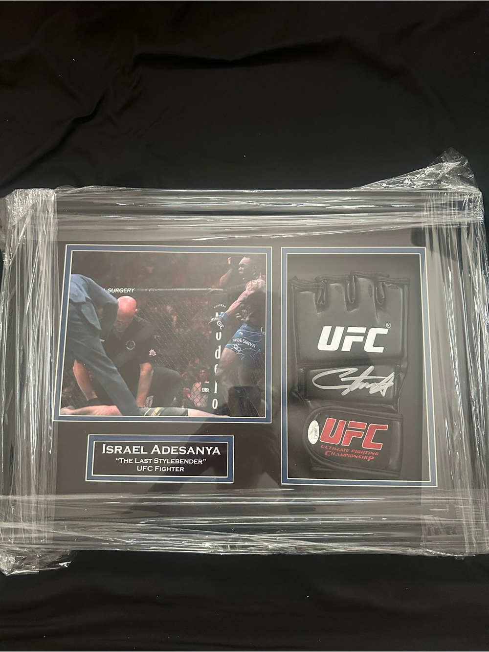 UFC Branded JSA Certification - SIGNED ISRAEL ADESANYA GLOVE FRAMED